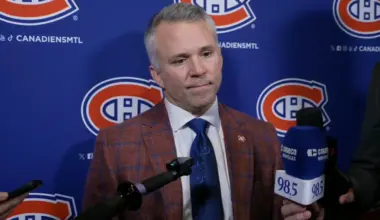 Photo of Montreal Canadiens head coach Martin St-Louis during media interview.