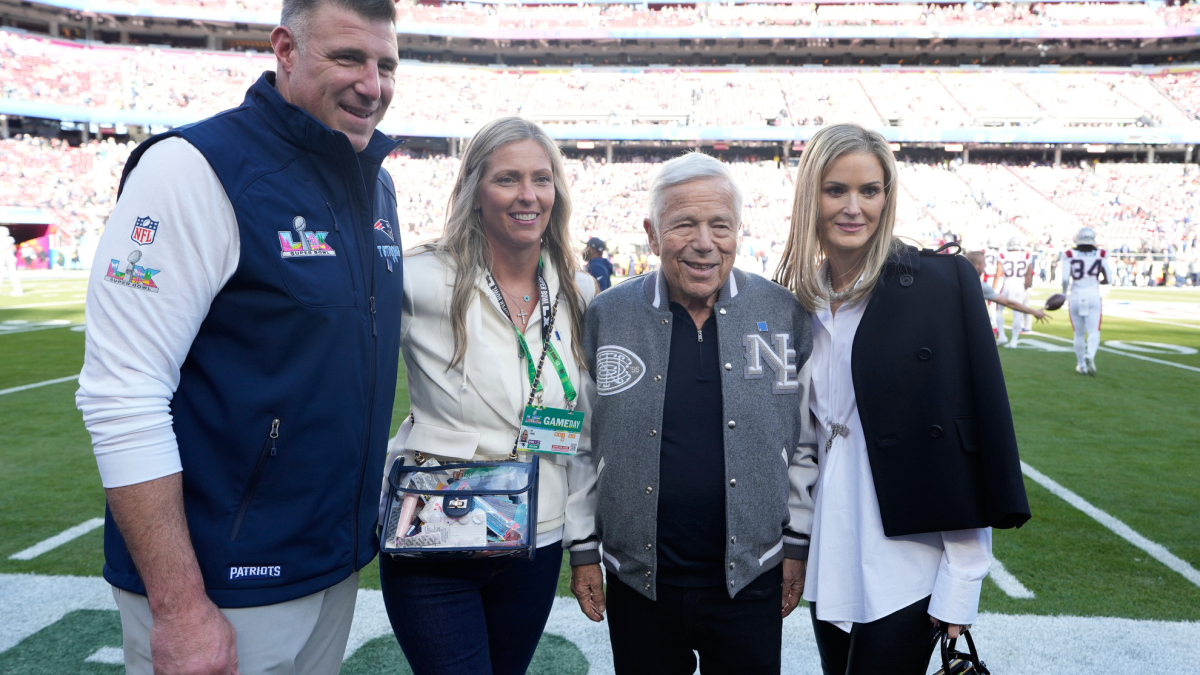 Mike Vrabel and his wife Jen don't seem too happy at Taylor Swift and Travis Kelce's wedding