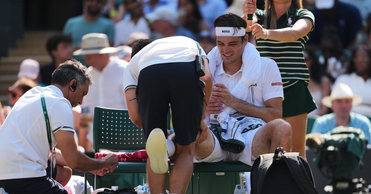 Taylor Fritz loses to Alexander Zverev in Wimbledon quarterfinals after knee tendinitis flares up
