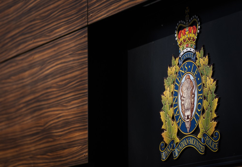 The RCMP logo is seen outside the force's 'E' division headquarters in Surrey, B.C., on March 16, 2023. THE CANADIAN PRESS/Darryl Dyck