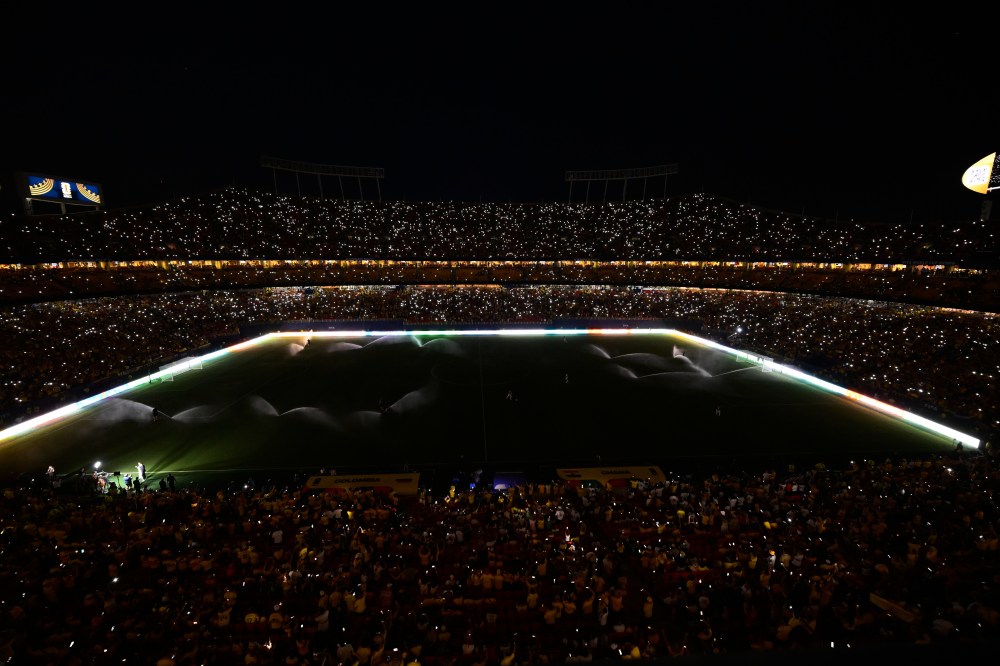 Fans take part in a light show with their mobile phones during halftime in the World Cup round of 32 soccer match between Colombia and Ghana in Kansas City, Mo., Friday, July 3, 2026. (AP Photo/Reed Hoffmann)