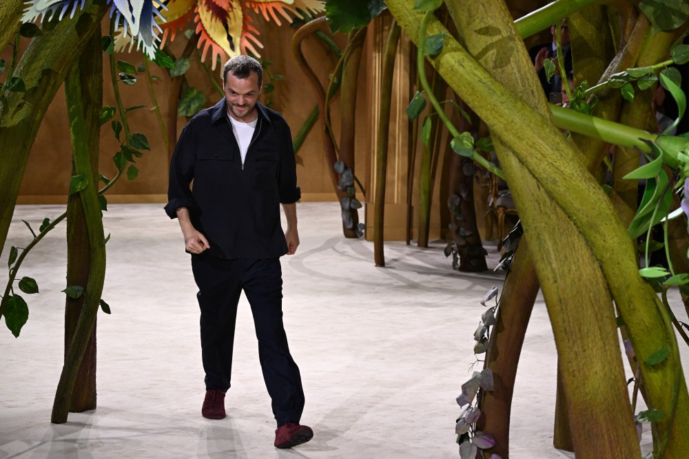 Designer Matthieu Blazy accepts applause after the Chanel Haute Couture Fall/Winter 2026-2027 Women's collection presented in Paris, Tuesday, July 7, 2026. (AP Photo/Emma Da Silva)
