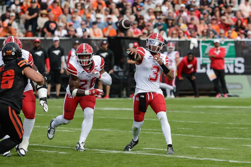 Calgary Stampeders quarterback Vernon Adams Jr. (3) drops back and passes against the B.C. Lions during first half CFL football action in Kelowna, B.C., on Saturday, June 27, 2026. THE CANADIAN PRESS/Steve Dunsmoor