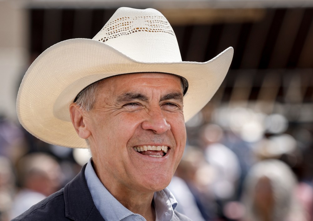 Prime Minister Mark Carney attends a Stampede breakfast in Calgary, Alta., Saturday, July 5, 2025. THE CANADIAN PRESS/Jeff McIntosh
