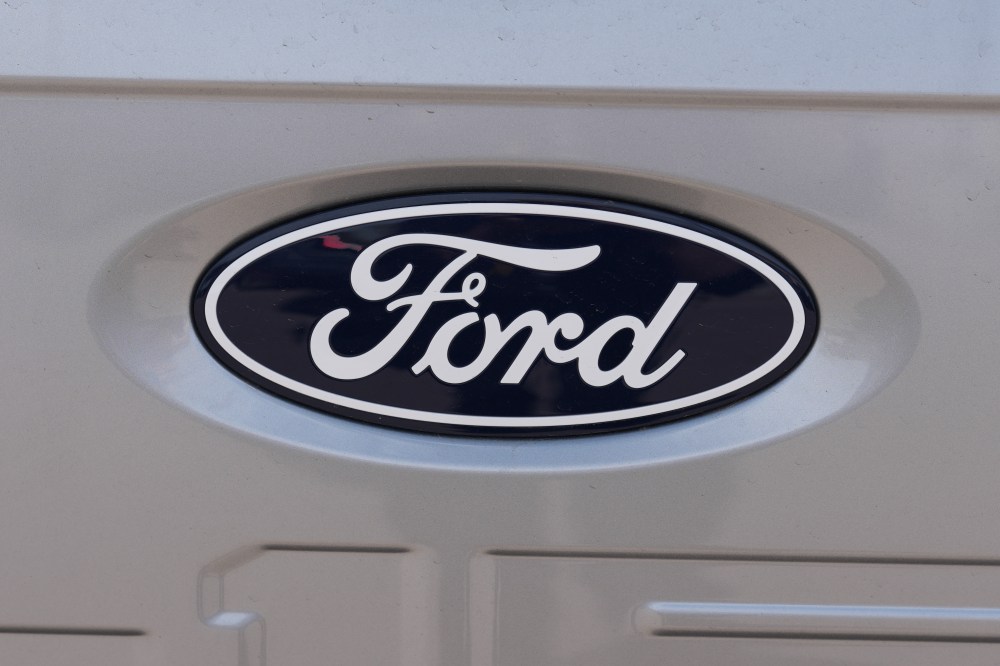 The company logo is shown on the tailgate of an unsold 2026 F150 pickup truck sitting for sale outside a Ford agency Sunday, April 12, 2026, in Centennial, Colo. (AP Photo/David Zalubowski)