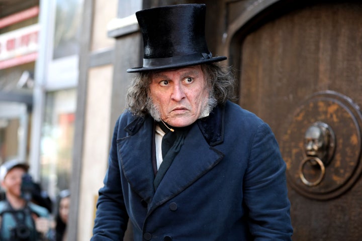 Johnny Depp attends San Diego Comic-Con as Ebenezer Scrooge on Thursday.