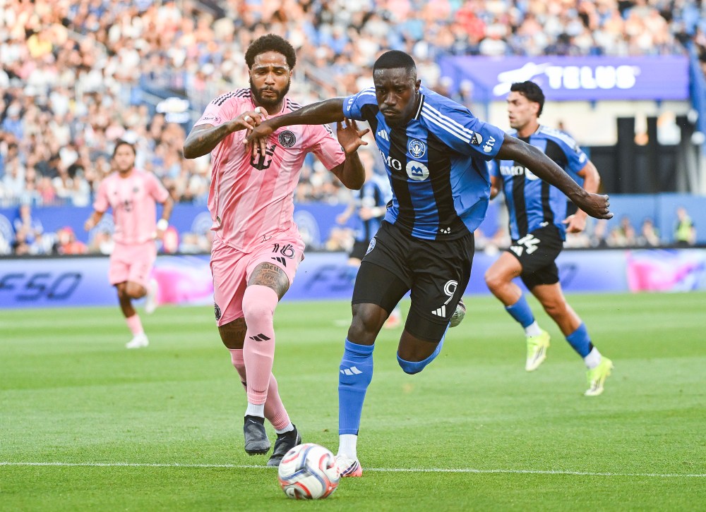 Inter Miami CF's Micael Dos Santos Silva (16) defends against CF Montreal's Prince Owusu (9) during first half MLS action in Montreal, on Saturday, July 25, 2026. THE CANADIAN PRESS/Graham Hughes