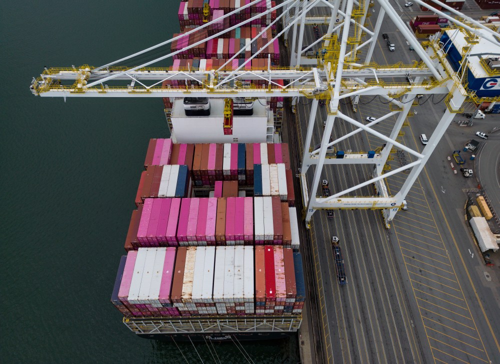 Containers are unloaded from the Yang Ming Throne container ship at Deltaport, at Roberts Bank in Delta, B.C., on Thursday, July 16, 2026. THE CANADIAN PRESS/Darryl Dyck