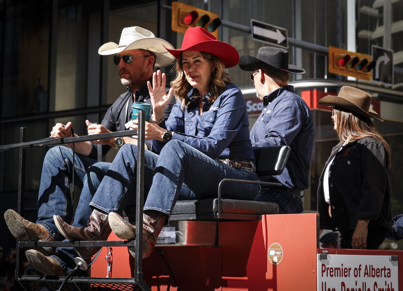 'You suuuuuck!': Smith gets cheers and jeers riding in Calgary Stampede parade