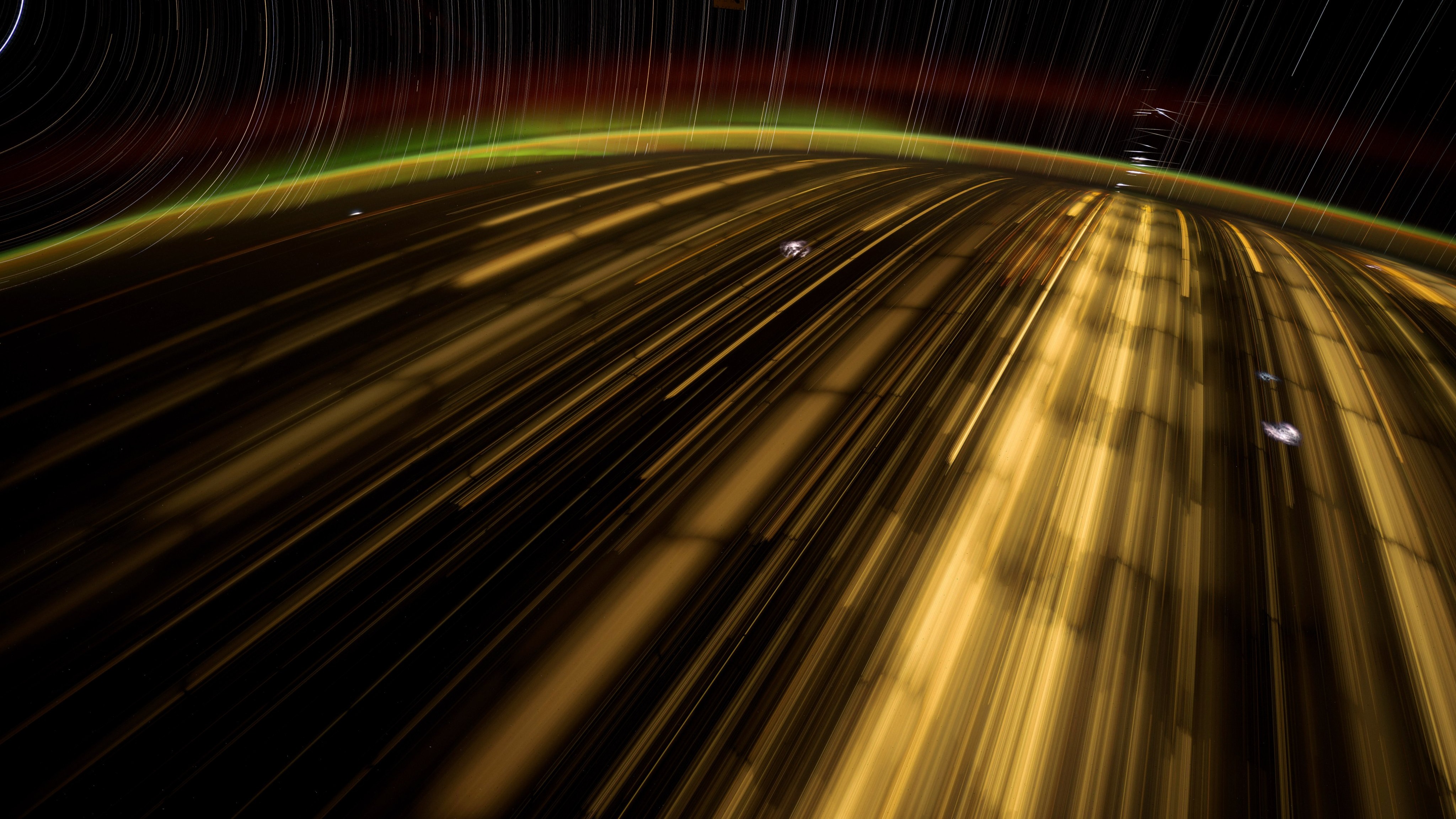 streaks of gold light on a black background