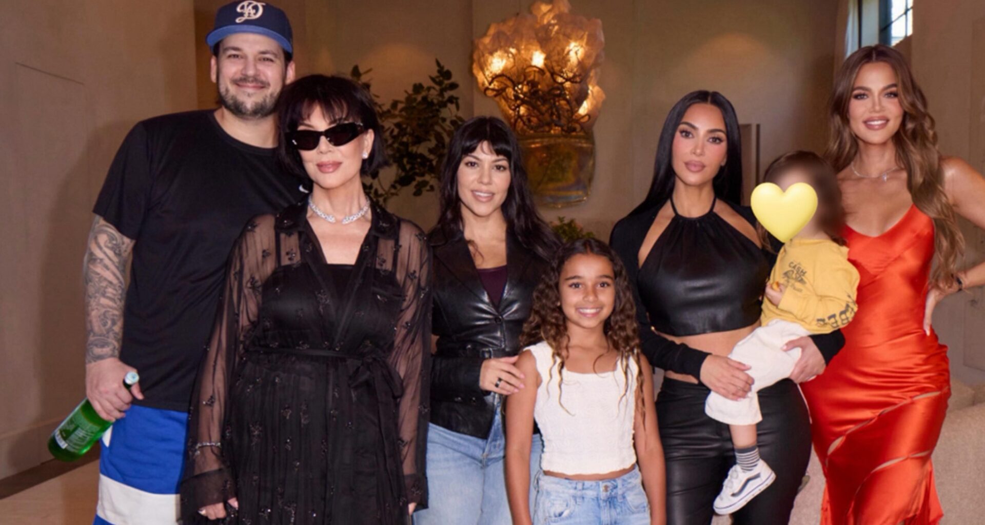 Rob Kardashian Flashes Huge Smile in Rare Family Photos