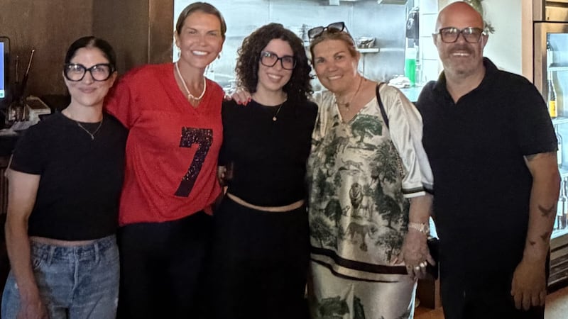 Cristiano Ronaldo's sister Katia Aveiro, second left, and her mother, Maria Dolores dos Santos Aveiro, second right, visit Mercado Restaurant for lunch while they are in Toronto for Portugal's World Cup match on July 2, 2026. They're pictured with Mercado owner Carlos Oliveira, right, his wife, far left, and daughter, centre.  (Courtesy of Carlos Oliveira)