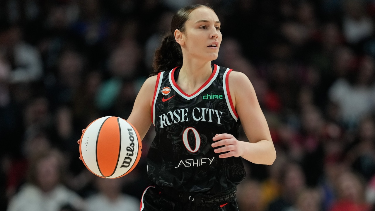 Carla Leite (0) dribbles down the court during the first half of a WNBA basketball game against the Chicago Sky (2026).