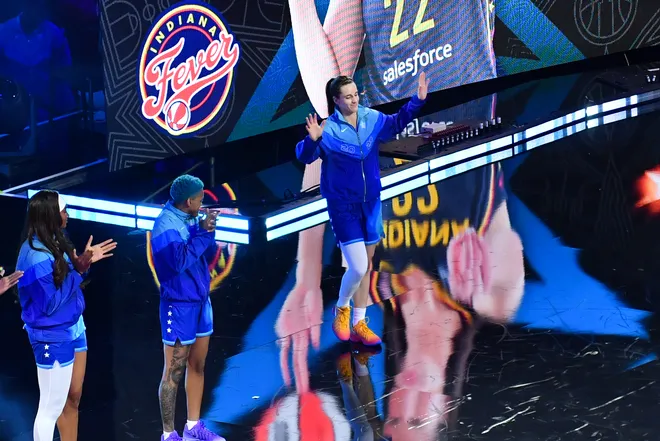 Jul 25, 2026; Chicago, Illinois, USA; Team Spoon guard Caitlin Clark (22) is introduced during the 2026 WNBA All-Star Game at the United Center. Mandatory Credit: Patrick Gorski-Imagn Images