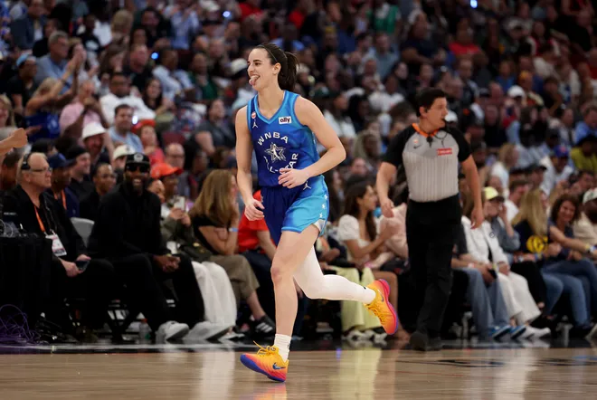 CHICAGO, ILLINOIS - JULY 25: Caitlin Clark #22 of Team Spoon celebrates a basket against Team Coop during the first half in the 2026 AT & T WNBA All-Star Game at the United Center on July 25, 2026, in Chicago, Illinois. NOTE TO USER: User expressly acknowledges and agrees that, by downloading and/or using this photograph, User is consenting to the terms and conditions of the Getty Images License Agreement. (Photo by Geoff Stellfox/Getty Images)