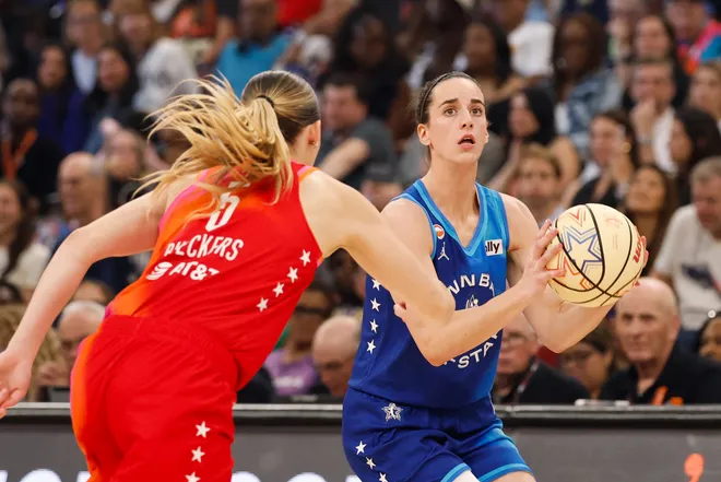 Jul 25, 2026; Chicago, Illinois, USA; Team Spoon guard Caitlin Clark (22) looks to shoot while defended by Team Coop guard Paige Bueckers (5) in the second half during the 2026 WNBA All-Star Game at the United Center. Mandatory Credit: Kamil Krzaczynski-Imagn Images