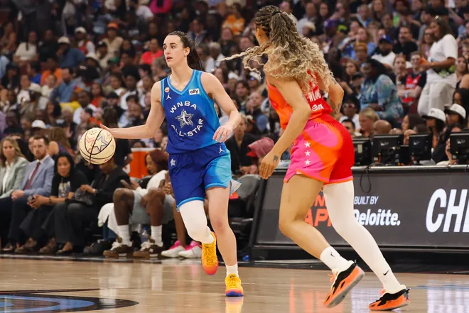 Jul 25, 2026; Chicago, Illinois, USA; Team Spoon guard Caitlin Clark (22) drives the ball in the second half against Team Coop during the 2026 WNBA All-Star Game at the United Center. Mandatory Credit: Kamil Krzaczynski-Imagn Images