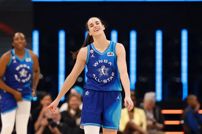 Jul 25, 2026; Chicago, Illinois, USA; Team Spoon guard Caitlin Clark (22) reacts in the second half against Team Coop during the 2026 WNBA All-Star Game at the United Center. Mandatory Credit: Kamil Krzaczynski-Imagn Images