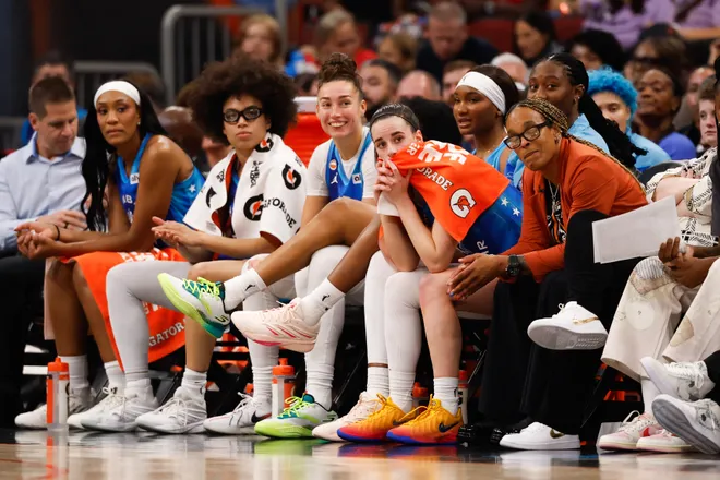 Jul 25, 2026; Chicago, Illinois, USA; Team Spoon guard Caitlin Clark (22) looks on from the bench during the 2026 WNBA All-Star Game at the United Center. Mandatory Credit: Kamil Krzaczynski-Imagn Images