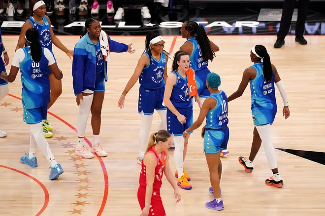 CHICAGO, ILLINOIS - JULY 25: Caitlin Clark #22 of Team Spoon and Courtney Williams #10 of Team Spoon celebrate against Team Coop at the end of the first half in the 2026 AT & T WNBA All-Star Game at the United Center on July 25, 2026, in Chicago, Illinois. NOTE TO USER: User expressly acknowledges and agrees that, by downloading and/or using this photograph, User is consenting to the terms and conditions of the Getty Images License Agreement. (Photo by Sage Zipeto/Getty Images)