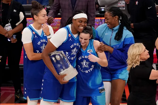 CHICAGO, ILLINOIS - JULY 25: Jonquel Jones #35 of Team Spoon celebrates with Caitlin Clark #22 after receiving the MVP Award after the 2026 AT & T WNBA All-Star Game at the United Center on July 25, 2026, in Chicago, Illinois. NOTE TO USER: User expressly acknowledges and agrees that, by downloading and/or using this photograph, User is consenting to the terms and conditions of the Getty Images License Agreement. (Photo by Sage Zipeto/Getty Images)