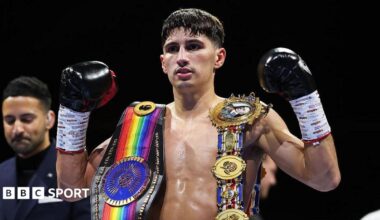 Royston Barney-Smith poses with his belts after winning in Scotland