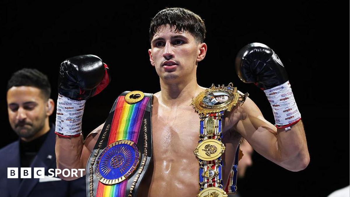 Royston Barney-Smith poses with his belts after winning in Scotland