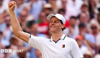 Jannik Sinner celebrates his victory over Novak Djokovic on Centre Court