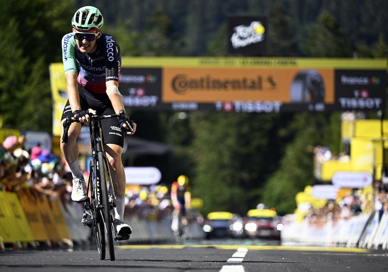 French rider Paul Seixas crosses the finishing line of stage 10 of the Tour de France on Tuesday, Bastille Day. Photograph: Jasper Jacobs/Getty