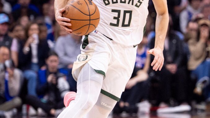 AP26103557172993 Milwaukee Bucks shooting guard Cormac Ryan brings the ball up during an April game. The former Tar Heel is trying to make a good impression during NBA Summer League