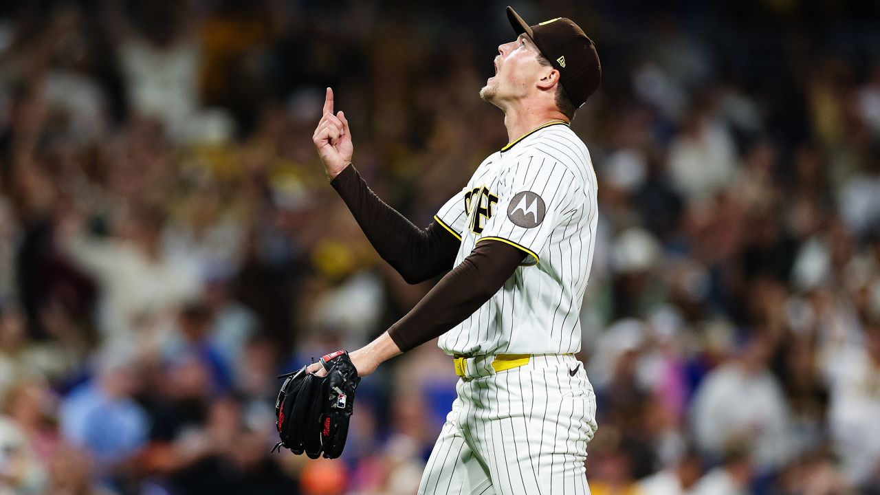 San Diego Padres' Mason Miller reacts after the team defeated the Toronto Blue Jays in a baseball game Saturday, July 11, 2026, in San Diego. (AP Photo/Derrick Tuskan)