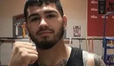 Muay Thai fighter Rambolek Chor Ajalaboon celebrates with the ONE World Title