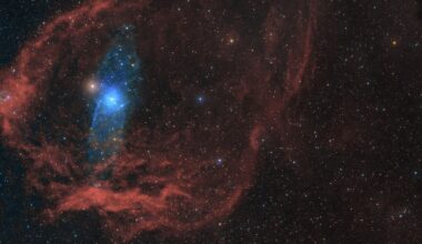 James Webb telescope hones in on origin of 'little red dots' at the beginning of time, thanks to their 'little blue companions'