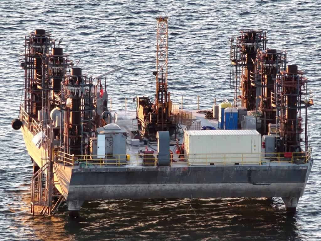 Big drilling rigs on Lake Ontario near Mississauga and Toronto almost done their work