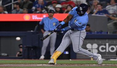 Tampa Bay Rays' Cedric Mullins (31) hits a double against the Toronto Blue Jays during the first inning of a baseball game in Toronto on Tuesday, July 21, 2026. (Jon Blacker/The Canadian Press via AP)
