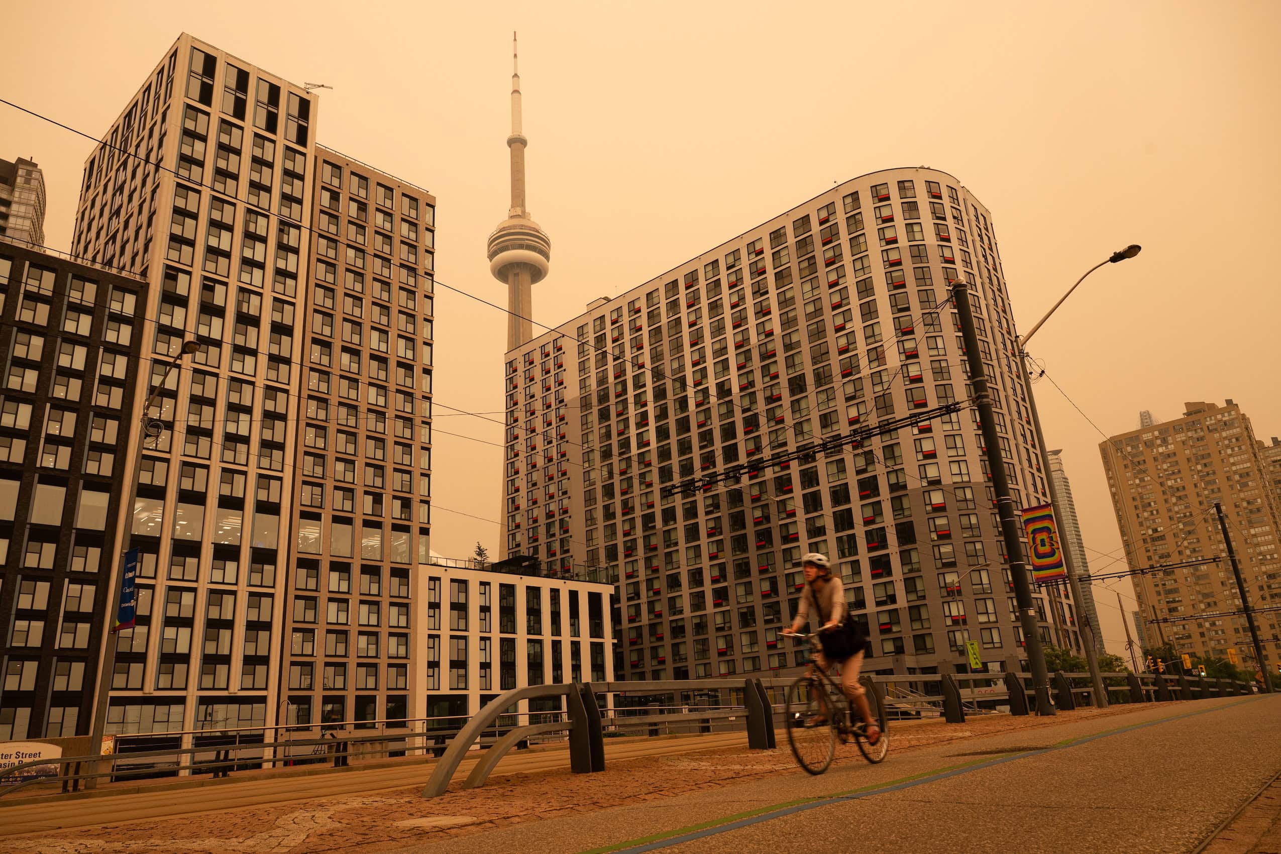 The Toronto downtown city skyline covered in a thick smoky haze.