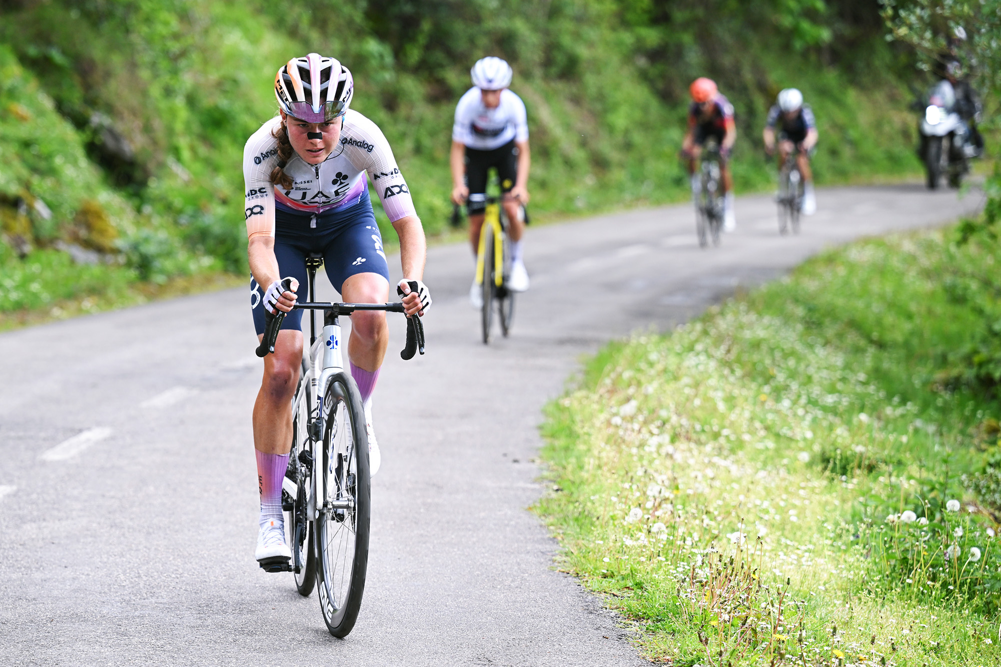 L'ANGLIRU, SPAIN - MAY 09: Paula Blasi of Spain and UAE Team ADQ attacks in the breakaway during the 12th La Vuelta Femenina 2026, Stage 7 a 132.9km stage from Pola de Laviana to L'Angliru 1555m / #UCIWWT / on May 09, 2026 in Pola de Laviana, Spain. (Photo by Szymon Gruchalski/Getty Images)