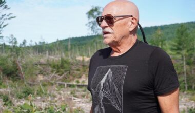 "Back Roads Bill" Steer, general manager of the Canadian Ecology Centre, stands in front of the storm damage at Samuel de Champlain Provincial Park.