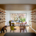 © Miran Kambic Renovation of two terraced houses of the housing cooperative "Progres - Mirje" Ljubljana / dans arhitekti - Interior Photography, Dining room, Wood, Shelving, Table, Lighting, Chair