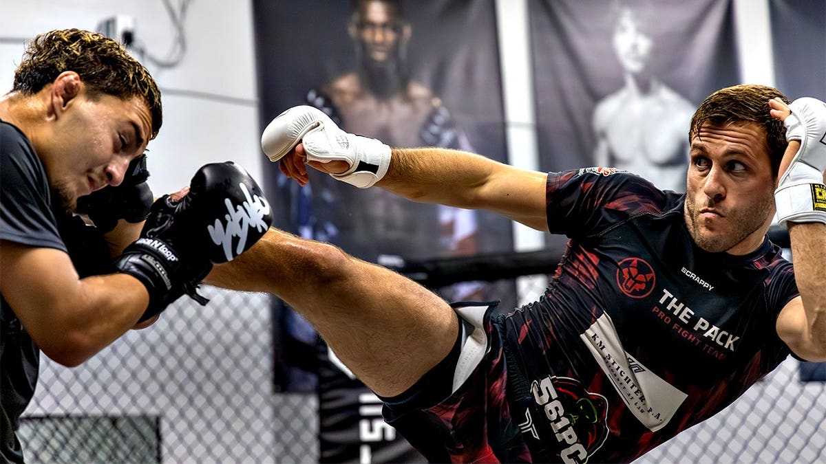 MMA fighter Dustin Lampros kicks