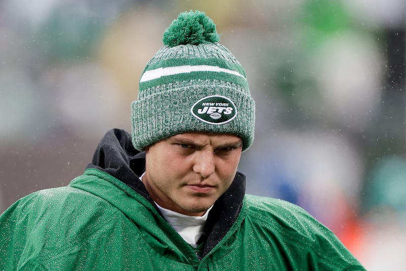 New York Jets quarterback Zach Wilson walks the sidelines during game against the Atlanta Falcons, Sunday, Dec. 3, 2023, in East Rutherford, N.J.