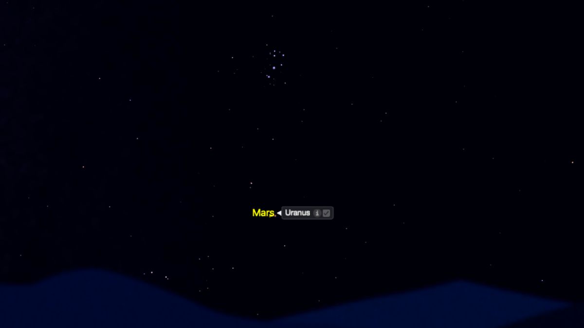 night sky graphic showing mars shining next to uranus.