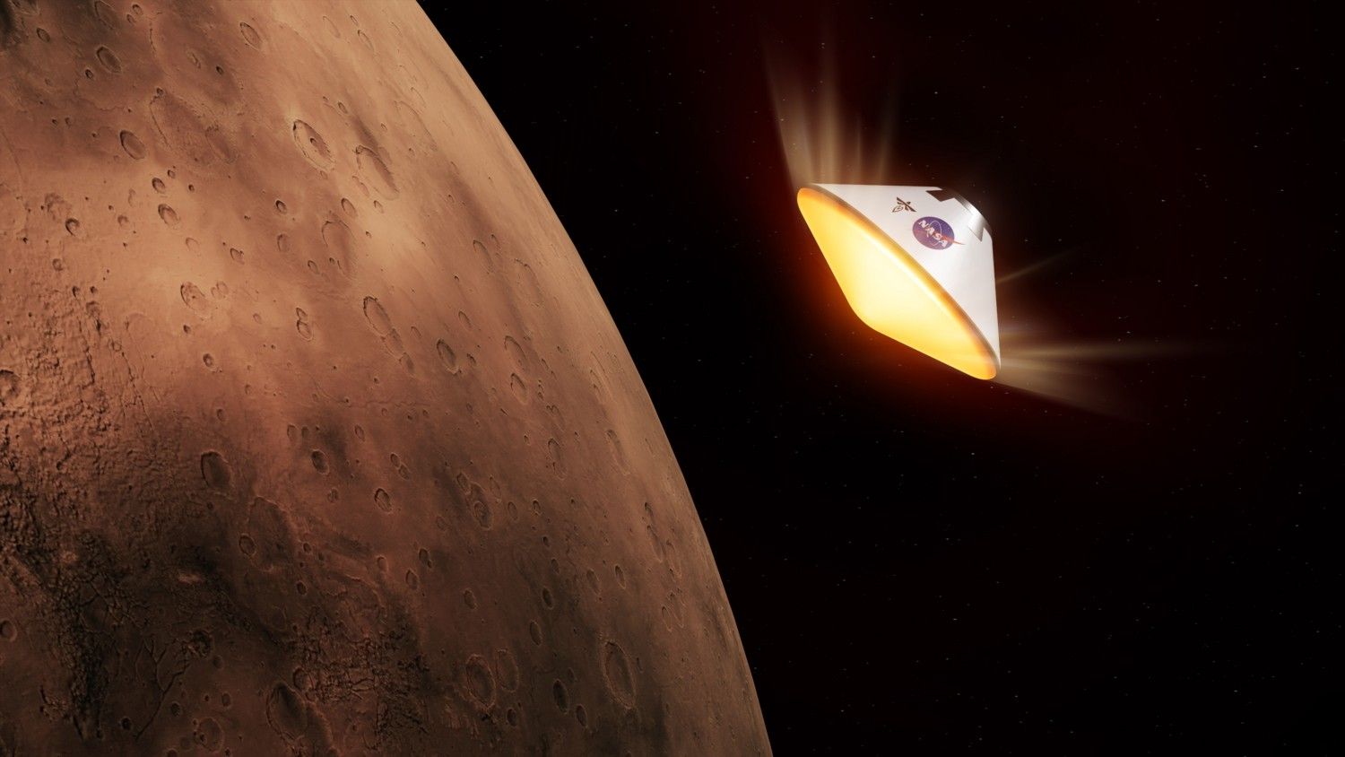 A space capsule with glowing heat shield approaches Mars from space