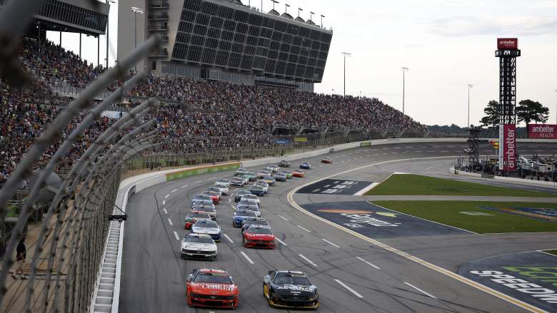 Cars race through Turn 1 during the NASCAR Cup Series Quaker State 400 at EchoPark Speedway.