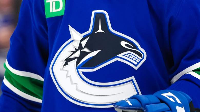 Max Sasson #63 of the Vancouver Canucks looks on during the first period of their NHL game against the Utah Mammoth at Rogers Arena on December 5, 2025 in Vancouver, British Columbia, Canada.