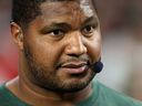 Calais Campbell #93 of the Arizona Cardinals looks on in the second half between the Ole Miss Rebels and the Miami Hurricanes during the 2025 College Football Playoff Semifinal at the VRBO Fiesta Bowl at State Farm Stadium on January 08, 2026 in Glendale, Arizona.