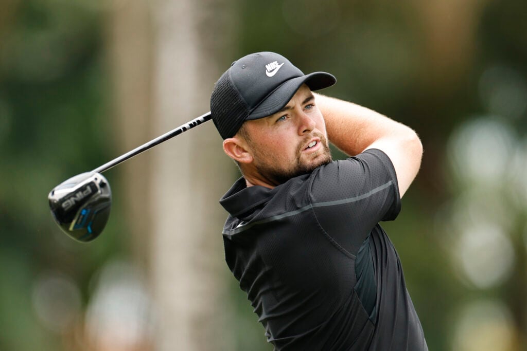 Alex Fitzpatrick tees off on the 12th hole during the final round of the Cadillac Championship