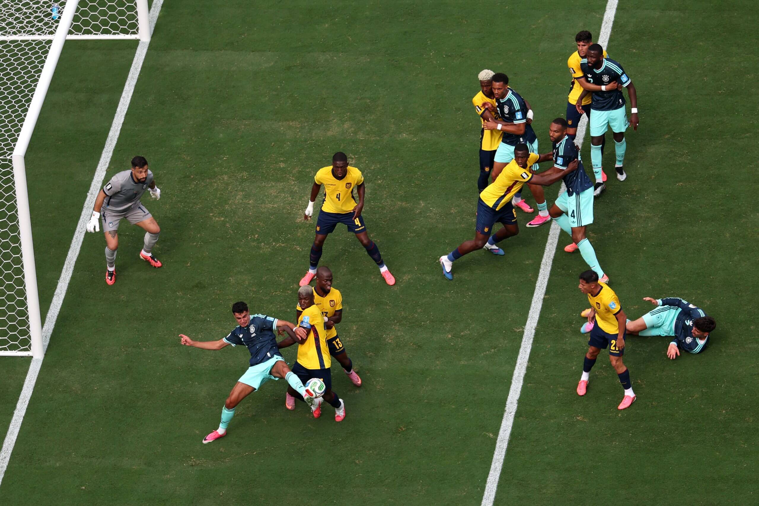 Aleksandar Pavlovic of Germany is challenged by Moises Caicedo of Ecuador during the World Cup Group E match 