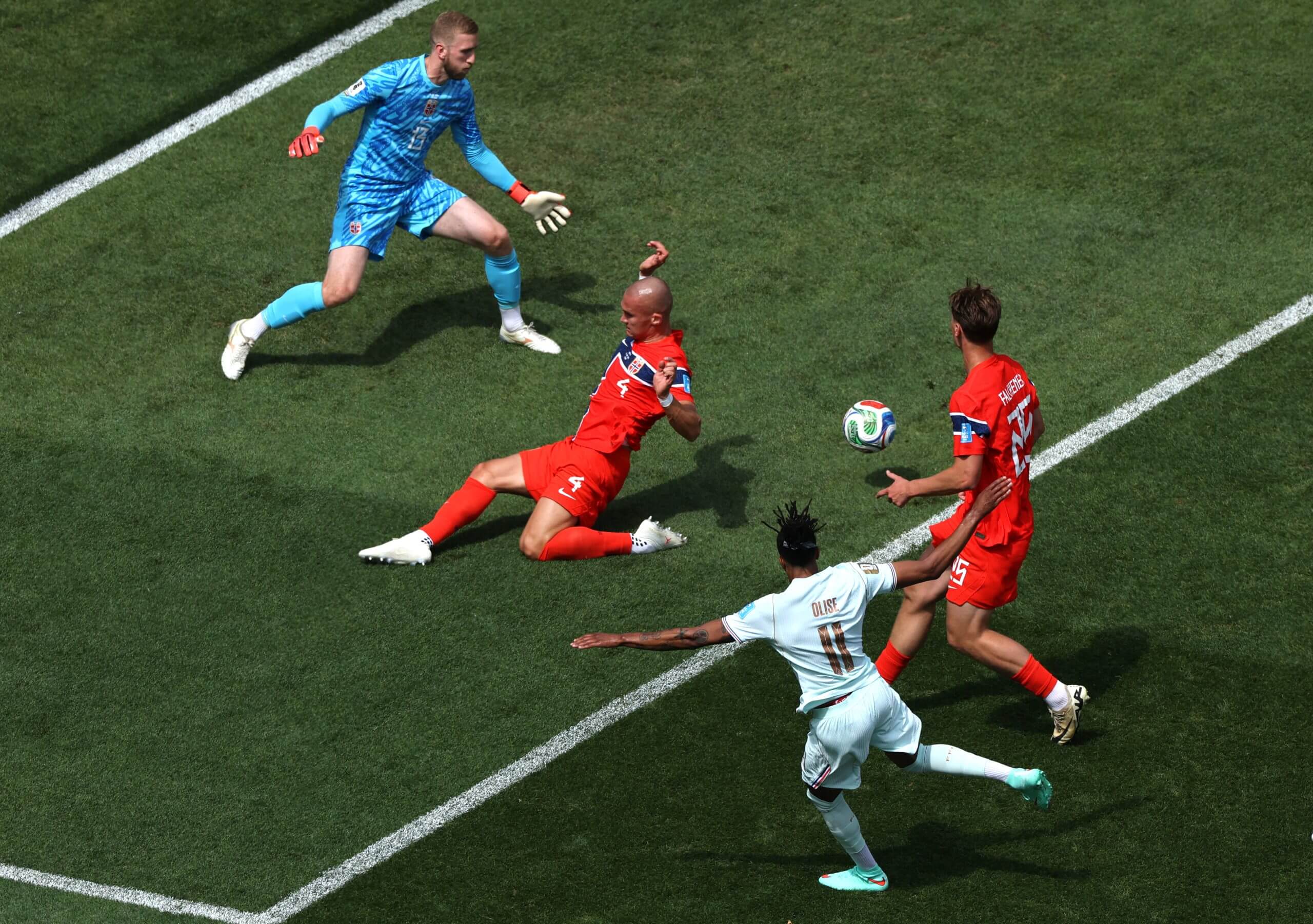 Michael Olise shoots and misses a chance against Egil Selvik, Leo Ostigard and Henrik Falchener of Norway during the World Cup Group I match against Norway at Gillette Stadium