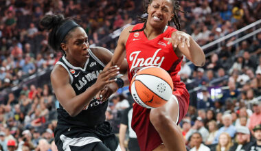LAS VEGAS, NEVADA - JULY 05: Kelsey Mitchell #0 of the Indiana Fever is fouled by Chelsea Gray #12 of the Las Vegas Aces in the fourth quarter of their game at T-Mobile Arena on July 05, 2026 in Las Vegas, Nevada. The Fever defeated the Aces 84-68. NOTE TO USER: User expressly acknowledges and agrees that, by downloading and or using this photograph, User is consenting to the terms and conditions of the Getty Images License Agreement. (Photo by Ethan Miller/Getty Images)